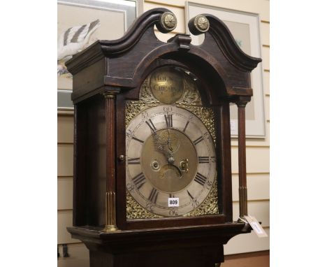 Holmes of Cheadle. A George III oak eight day longcase clock W.48cm