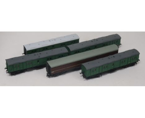 A collection of 46 Bachmann, Southern Pride and other coaches and goods wagons in a mixture of green and maroon livery, assem
