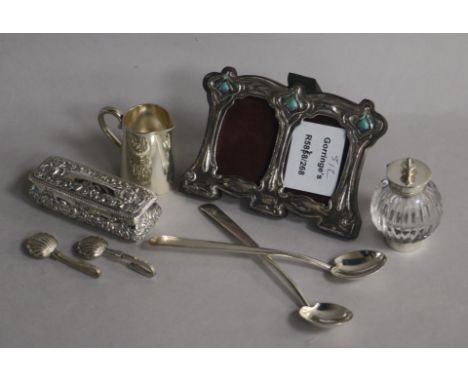 An early 20th century Art Nouveau sterling silver and enamel(a.f.) double photograph frame and other items including silver b