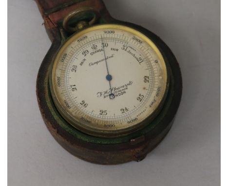 A pocket barometer, leather cased