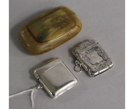 Two silver vesta cases and a 19th century horn snuff box.