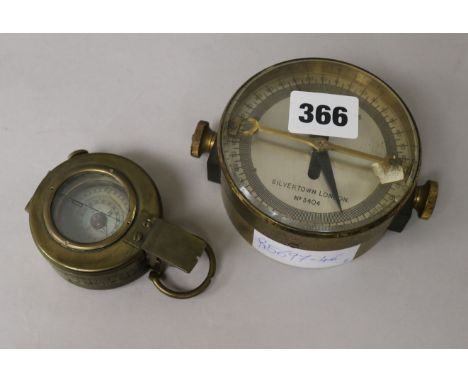 A telegraph works compass and a World War II compass