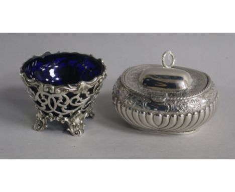 A Victorian pierced silver salt, James & Nathaniel Creswick, Sheffield, 1853, 62mm and a later silver tea caddy?, London, 189