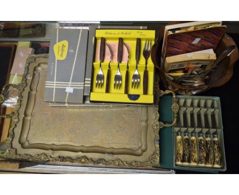 Metalware - an Art Nouveau copper planter, stylised flower design; an Islamic twin handled tray; 1960s flatware, teak handled