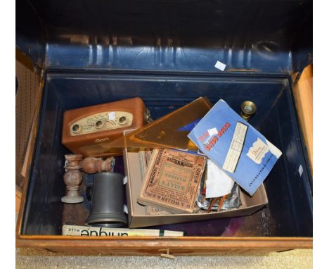 A 1950s television magnifying screen; a pair brass candlesticks; a vintage Roberts radio etc; all in a tin, domed top trunk