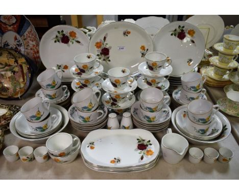 An Alfred Meakin part dinner and tea set comprising plates, side plates, egg cups, bowls, cups and saucers, etc; another, Woo