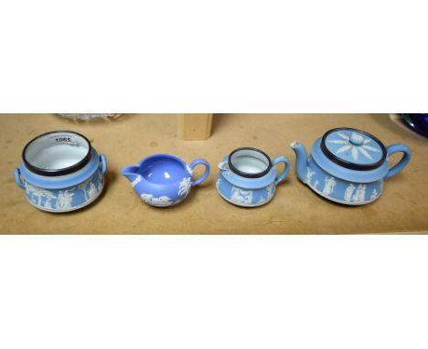 An Edwardian Wedgwood jasper ware silver rimmed tea set comprising teapot, cream jug and sugar bowl, Birmingham 1903; etc (4)