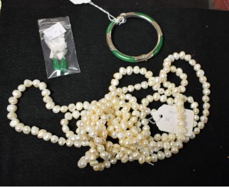 A freshwater pearl necklace, six strands, silver clasp; a silver and jade type stone bangle, chased decoration; a pair of dro