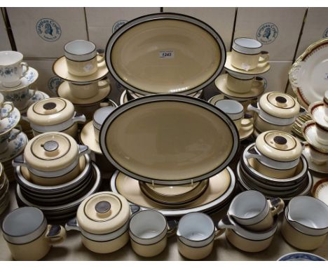 Ceramics - a comprehensive Denby dinner service to include dinner plates, soup bowls, cups and saucers, jugs etc
