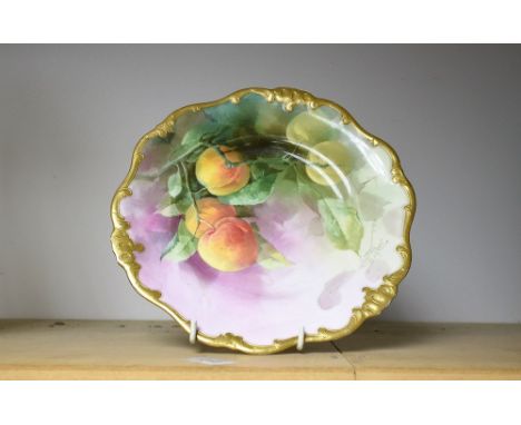 A Royal Doulton shaped cabinet plate, hand painted with nectarines, signed K. Piper