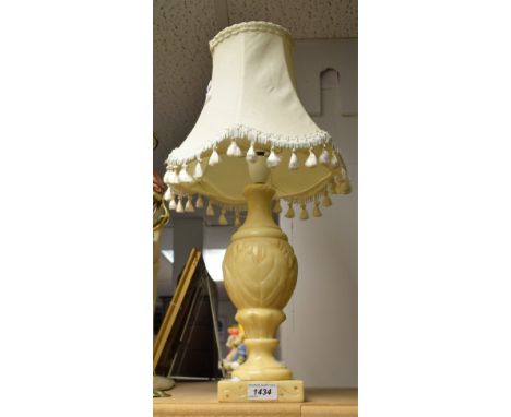 An alabaster table lamp