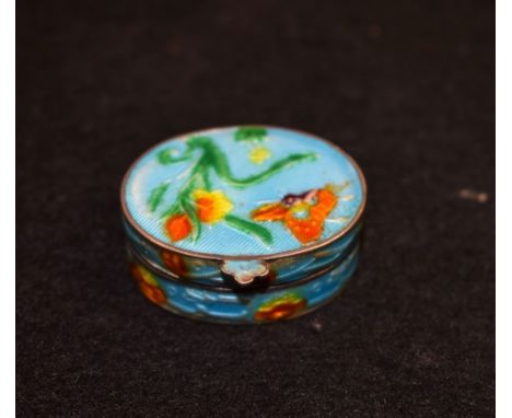 A silver and enamel Art Nouveau oval pill box