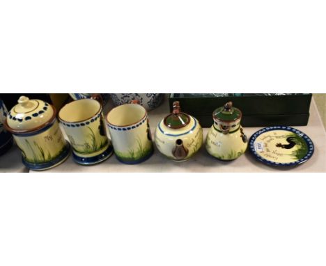 A Torquay Pottery Mottoware teapot and cover,  decorated with black cockerel, inscribed Good Morning, Drown your Sorrows in a