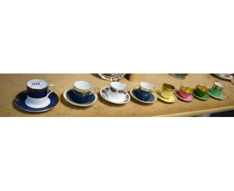 A pair of Royal Worcester coffee cups, mottled blue ground, gilt detail; a Royal Doulton cup and saucer, green ground, gilt d