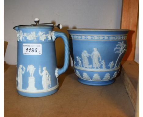 An early 20th century Wedgwood light blue jasperware ogee shaped planter, sprigged in the Classical taste, impressed marks, c