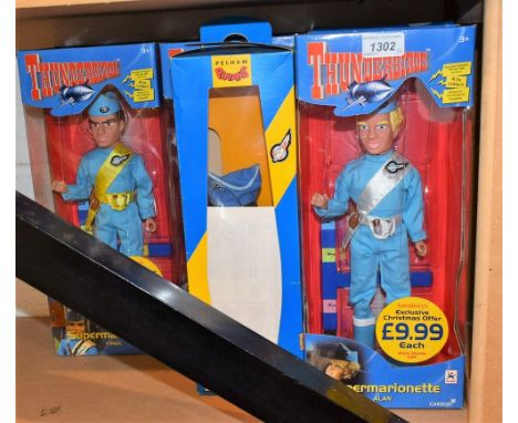 Thunderbirds Toys - a Carlton Supermarionette action figure, Scott Tracy;  others Alan, Virgil and The Hood, part sealed, all