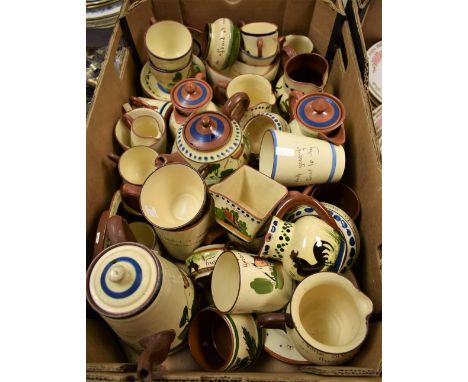 A Devon terracotta motto ware coffee pot, cups and saucers, cream jugs, sugar bowls, water jugs, others similar, large qty
