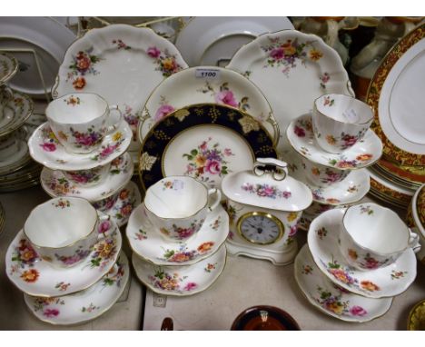 A Royal Crown Derby Posie pattern tea set, comprising twelve cups, twelve saucers, twelve tea plates, pair of bread and butte