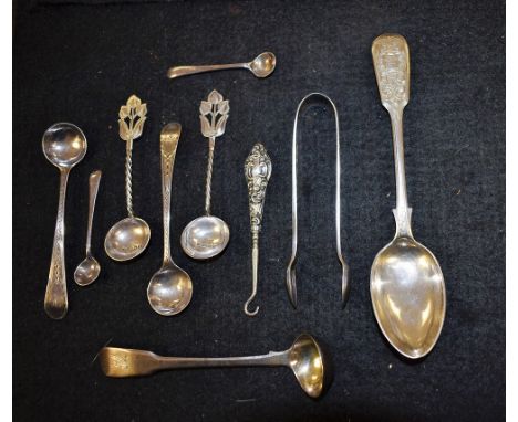 A silver teaspoon, Exeter 1870; a pair of sugar bows, Sheffield 1902; others, condiment spoons, button hook, etc 90g gross