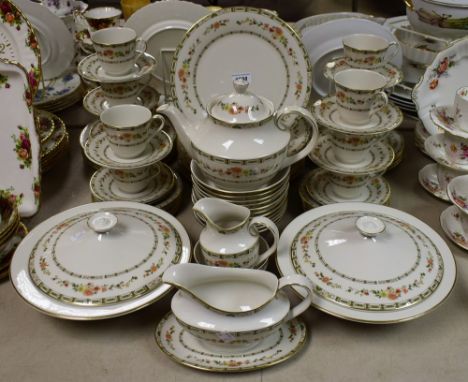 A Royal Doulton Mosaic Garden pattern dinner and tea service for ten, including dinner, side, salad plates, bowls, teapot, su