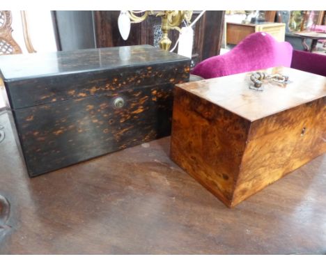 AN EARLY 19TH.C.BURR YEW WOOD TEA CADDY WITH FITTED INTERIOR TOGETHER WITH A COROMANDEL TEA CADDY OF LARGE SIZE BY LEUCHARS.