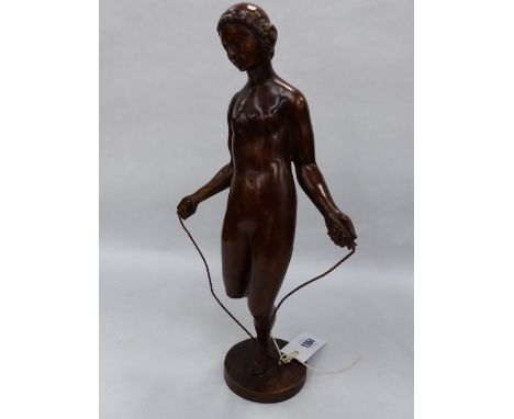 G.CHAUVEL (FRENCH 18800-1962) AN ART DECO NUDE GIRL SKIPPING, SIGNED AND STAMPED SUISSE F, EDT,PARIS. H.36cms