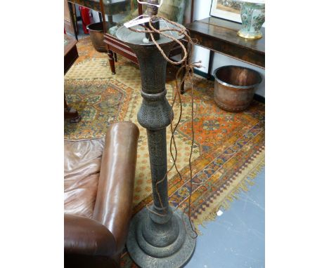 A PIERCED  BRASS MOORISH DESIGN FLOOR STANDING LAMP BASE WITH CALLIGRAPHIC DECORATION, ELECTRIFIED. H.138cms