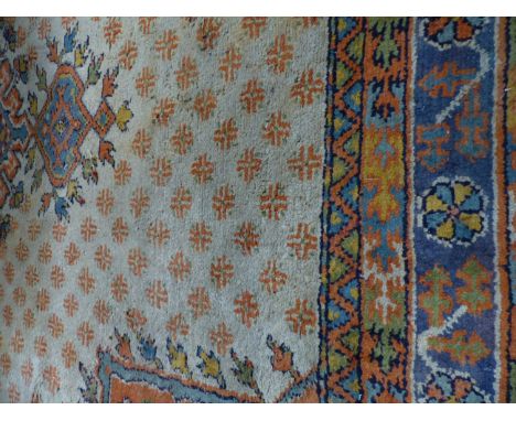 AN ORIENTAL CARPET OF TURKISH OUSHAK DESIGN. 367 X 313CM