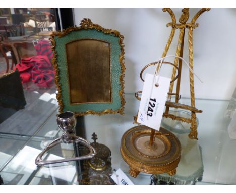 AN ORMOLU MOUNTED SHAGREEN EASEL BACK PHOTO FRAME, A FRENCH EMPIRE ORMOLU AND MARBLE RING STAND, A SMALL GILT METAL EASEL AND
