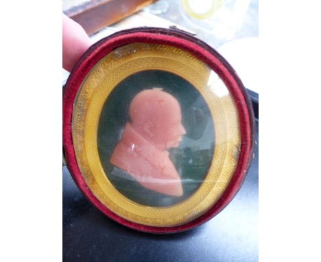 A EARLY 19TH.C.WAX OVAL PROFILE PORTRAIT OF A GENTLEMAN IN A MOROCCO LEATHER FITTED CASE.