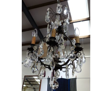 A FRENCH SIX LIGHT CAGE FORM PRISM HUNG CHANDELIER IN THE LOUIS XV STYLE.  H.68cms.