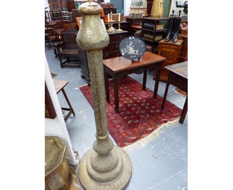 A PIERCED BRASS MOORISH DESIGN FLOOR STANDING LAMP BASE. OVER ALL CALLIGRAPHIC AND FIGURAL DECORATION. ELECTRIFIED. OVER ALL 