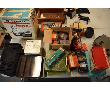 A mixed collection of items to include a Rondette 35mm colour slide projector, a Revue auto viewer, a trident viewer, slides 