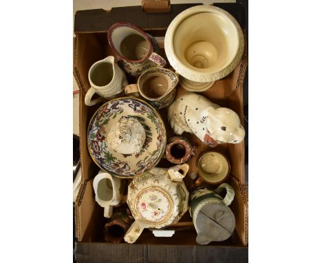 A good collection of mainly 19th century pottery to include a Dartmouth urn, Staffordshire dogs, Dudson,  a teapot etc. No po