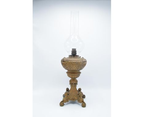 Victorian cast oil lamp base converted to electric with shade. in need of re-wiring, 35cm tall without shade 