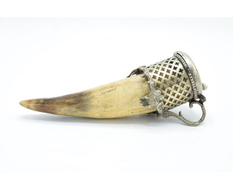 An unusual horn snuff mull/ box with a silver plate lid section and ornate mount. In good condition with no obvious damage or