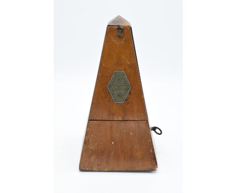 A 20th century wooden cased 'Metronome de Maelzel'. In ticking order though untested for time keeping/ long periods of time. 
