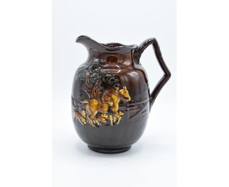 Royal Doulton Kingsware jug decorated with hunting scenes. In good condition with no obvious damage or restoration. Surface w