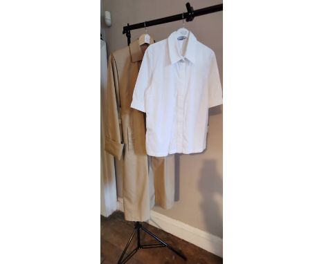 A Givenchy blouse, white cotton, Paris label, but made in Italy, cottage concealed buttons down front; a Aquascutum classic l