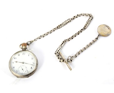A vintage silver half hunter pocket watch with a white metal fancy Albert chain and fob. The pocket watch with a white enamel