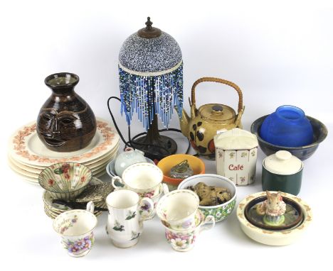 Assorted ceramics and collectables. Including a beaded bronzed-style table lamp, a Cornish studio pottery face mask tealight 