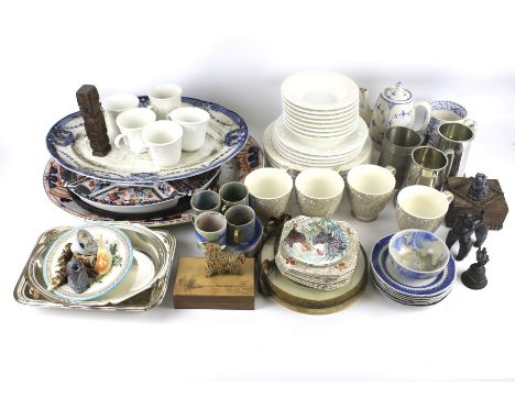 An assortment of ceramics and collectables. Including pewter tankards, marble effect teacups and saucers, a Danish blue and w