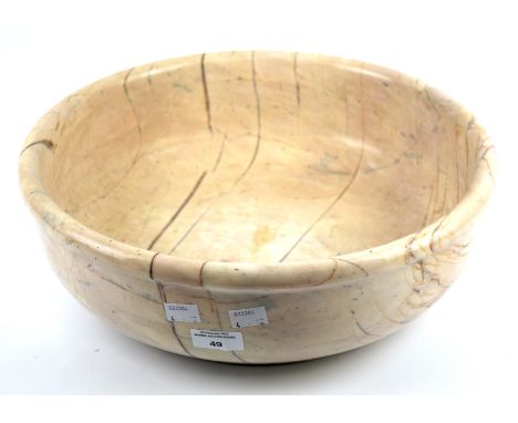 A 20th century pink marble bowl. Of circular form with a rim, 13cm high, 40cm diam Condition Report: Overall in good-very goo