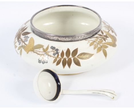 A late Victorian Royal Worcester 'Longton Hall' silver mounted Aesthetic Movement bowl and a ladle. Printed mark beneath, the