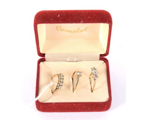 Three vintage yellow metal and 9ct gold rings. Comprising a 9ct gold five stone ring, size K, 1.5g gross, a yellow metal sing