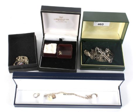 An assortment of white metal jewellery. Including necklaces, rings, a cross pendant, chain bracelet, etc, the majority stampe