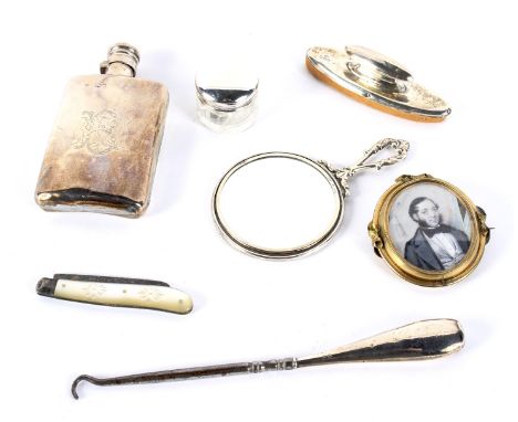 An assortment of Victorian and later silver and white metal. Including a hip flask, silver handled button hook, mother of pea