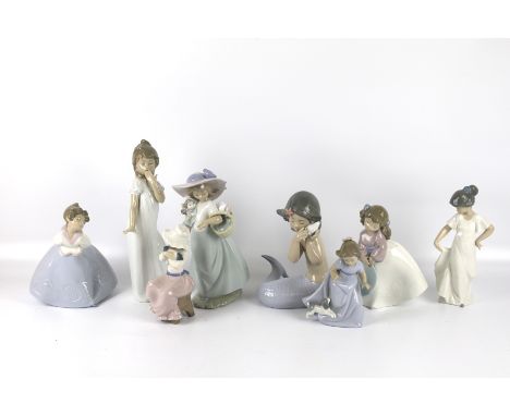 Eight assorted Nao porcelain girl figures all in original boxes. Including 'It's a picnic', Max H29cm 