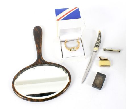 An assortment of collectables. Including a boxed Accurist watch, Dupont lighter with a textured case, hand mirror and mother 
