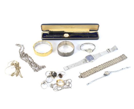 An assortment of costume jewellery and watches. Including a silver bangle, a gentleman's Seiko watch, ladies Rotary watch, tw